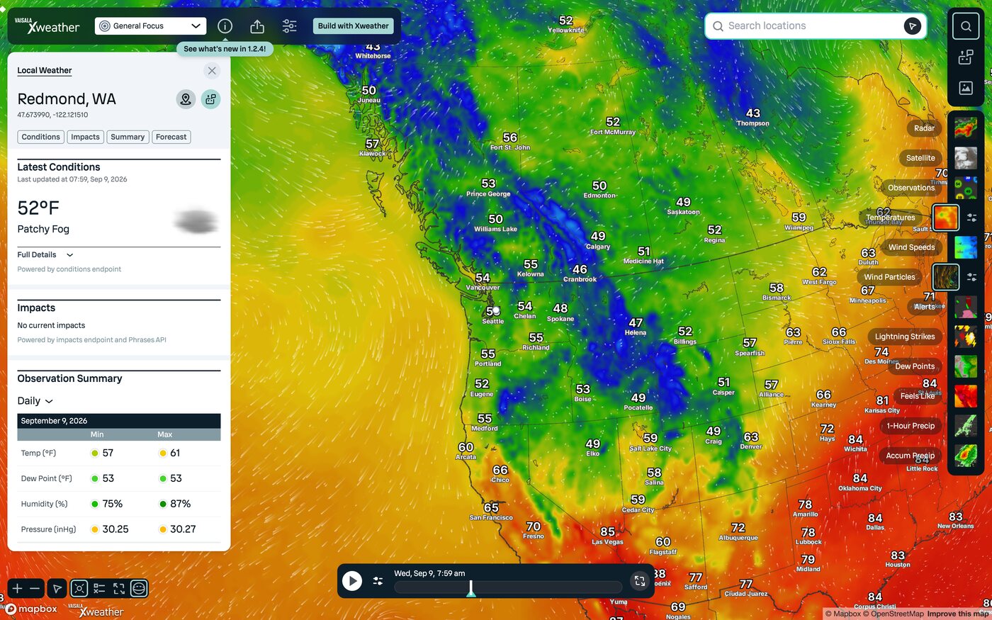 A continental temperature layer with wind particles, station readings and a local weather panel for Redmond, Washington.